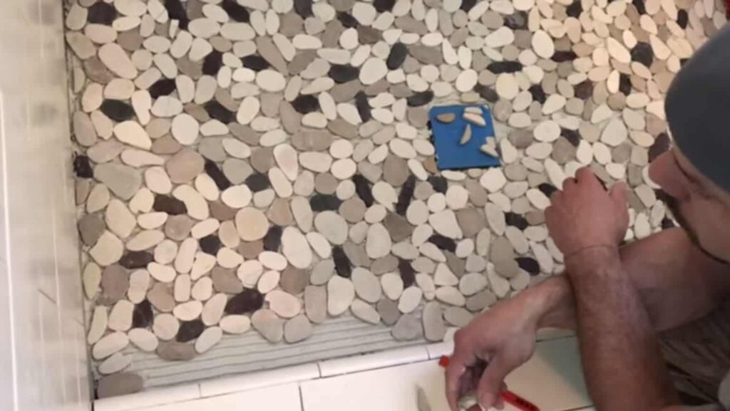 You are currently viewing Pebble Tile Shower Floor Problems: What You Need to Know